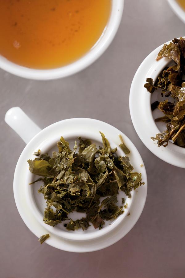 Leftover Green Tea Leaves Photograph by Studio Lipov