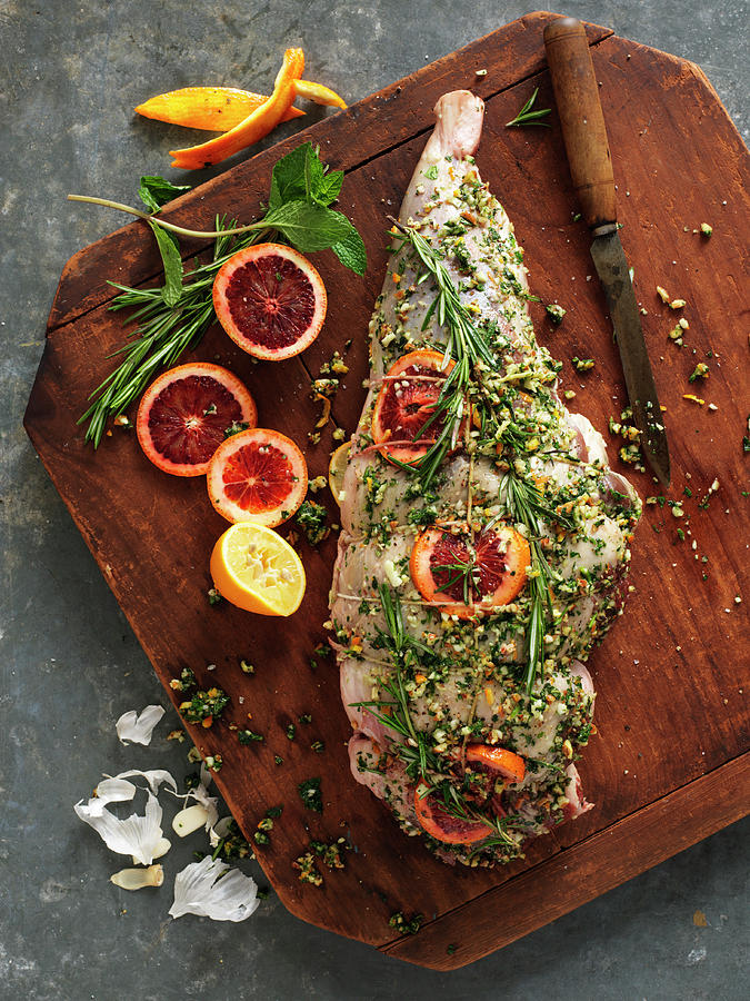Leg Of Lamb With Herbs, Spices And Blood Orange Slices ready To Roast Photograph by Jim Scherer