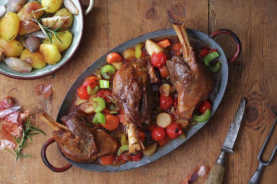 Leg Of Lamb With Vegetables And Potatoes Photograph by Frank Weymann