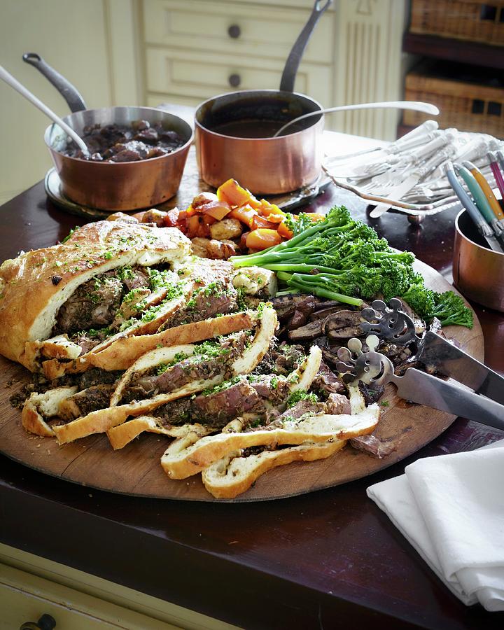 Leg Of Lamb Wrapped In Bread With Vegetables Photograph by Great Stock!