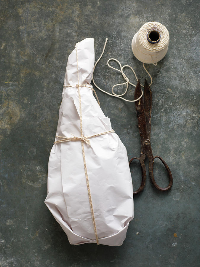 Leg Of Lamb Wrapped In Paper Photograph by Jim Scherer
