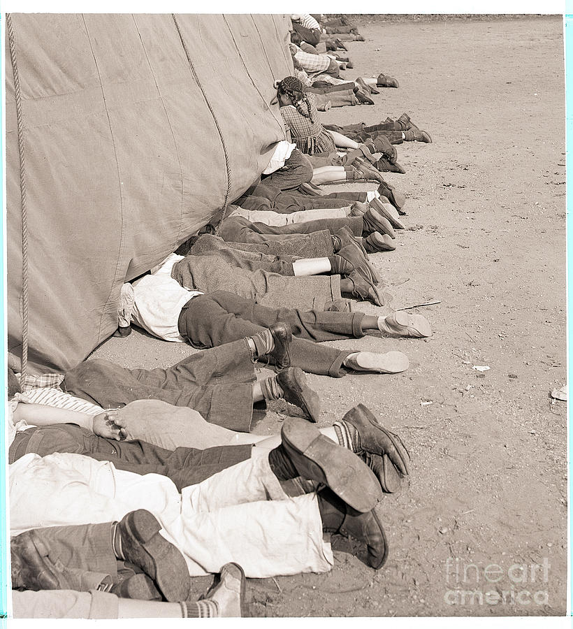 Legs Protruding From Circus Tent Photograph by Bettmann