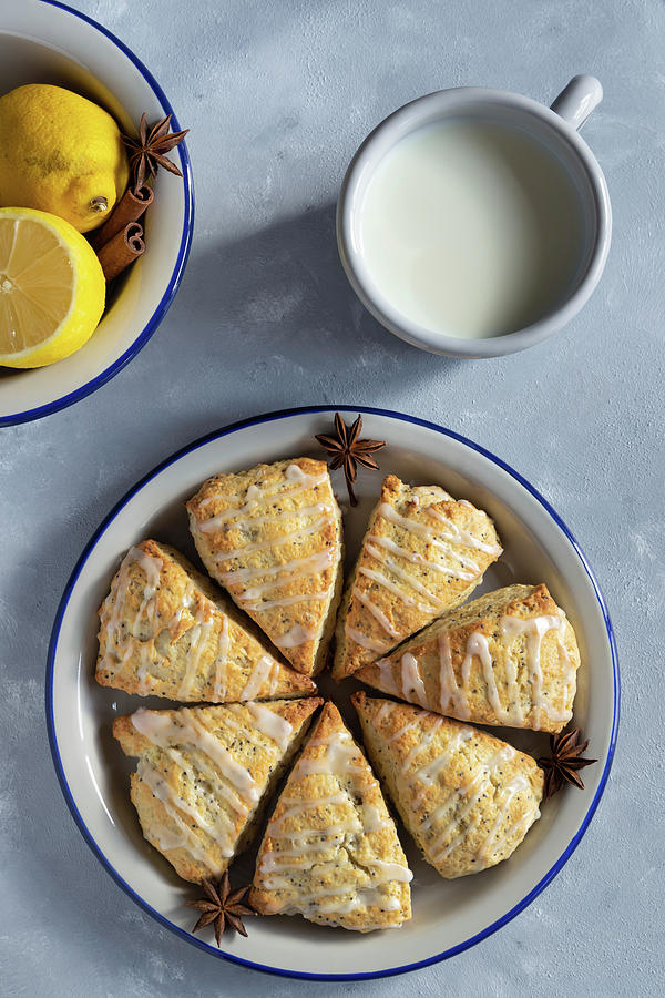 Lemon And Poppy Seed Scones With Glaze Photograph by Alla Machutt
