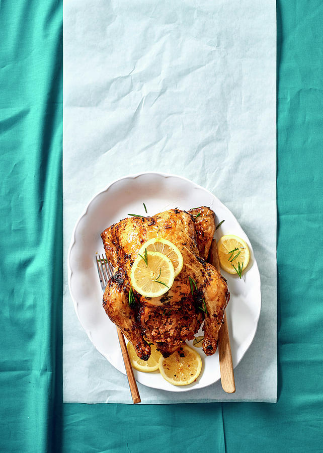 Lemon And Rosemary Roast Chicken With Chorizo Stuffing Photograph by Great Stock!