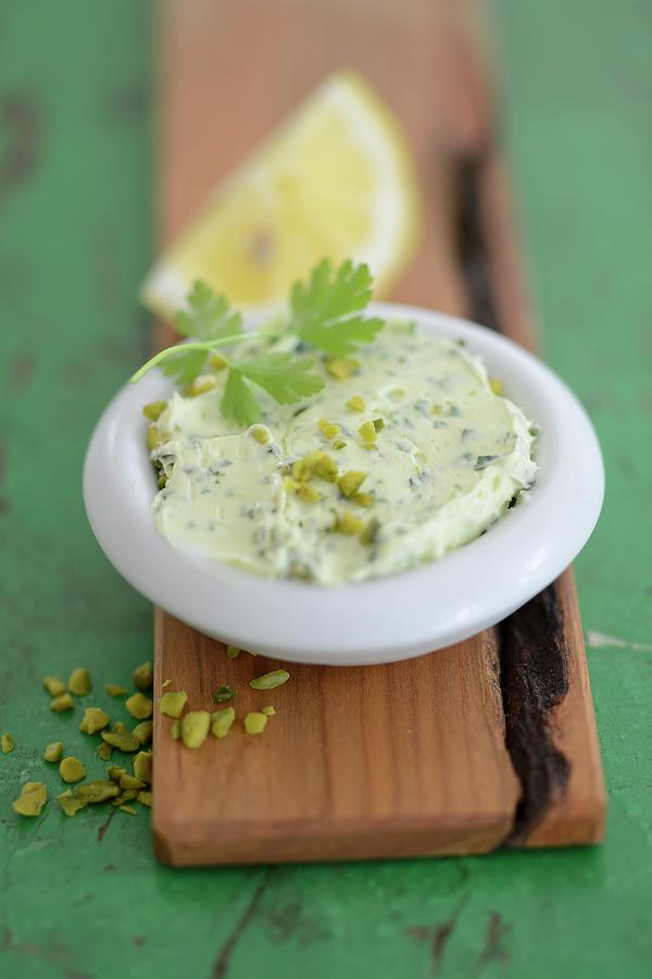 Lemon Butter With Herbs And Pistachios Photograph by Tanja Major