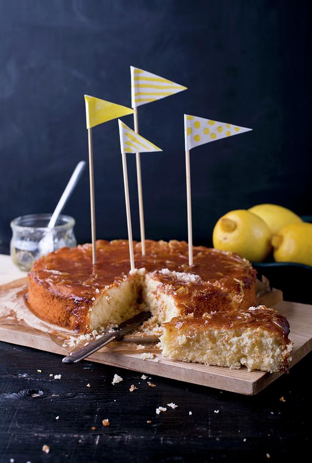 Lemon Cake Decorated With Flags, Sliced Photograph by Dorota Indycka