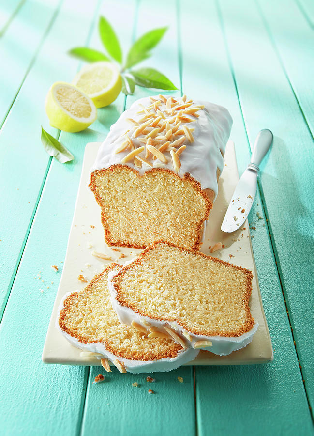 Lemon Cake With Icing And Almond Nibs, Sliced Photograph by Frank Gllner