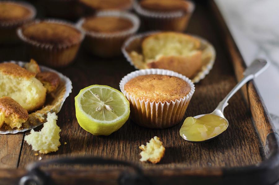 Lemon Cupcakes On A Wooden Tray Photograph by Nick Sida