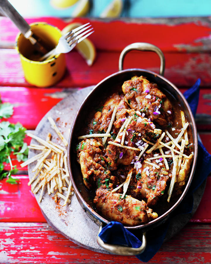 Lemon Curry Chicken With Red Onion, Parsley And Fries Photograph by Karen Thomas