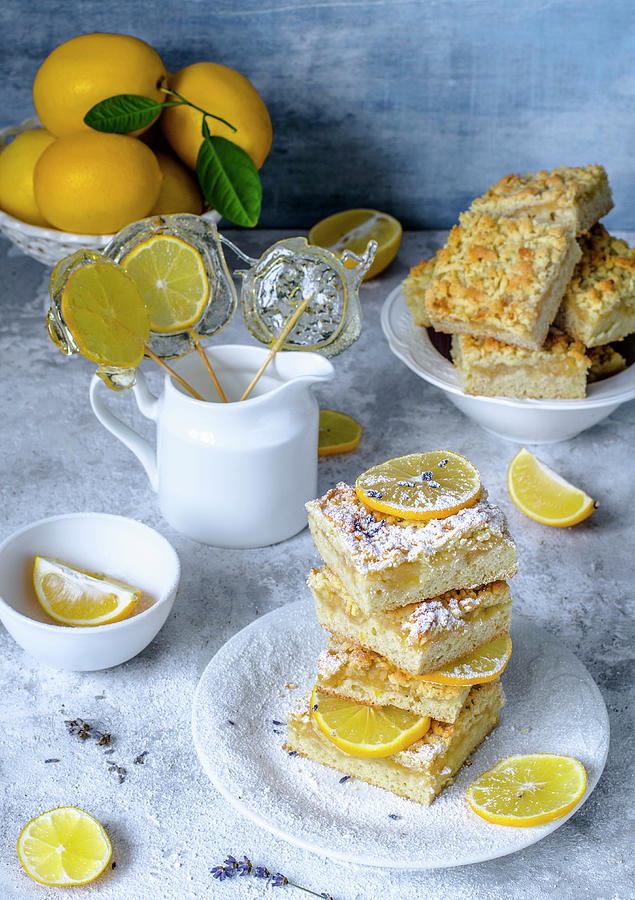 Lemon Pie Cut By Squares, Decorated With Lemon Candies And Fresh Lemons Photograph by Gorobina