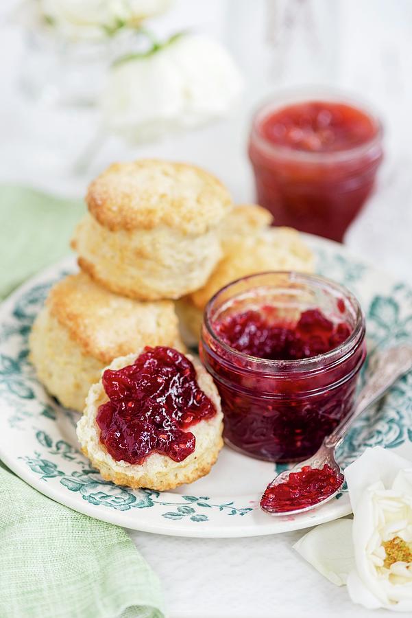 Lemon Scones With Cherry And Raspberry Jam For Afternoon Tea Photograph by Lucy Parissi