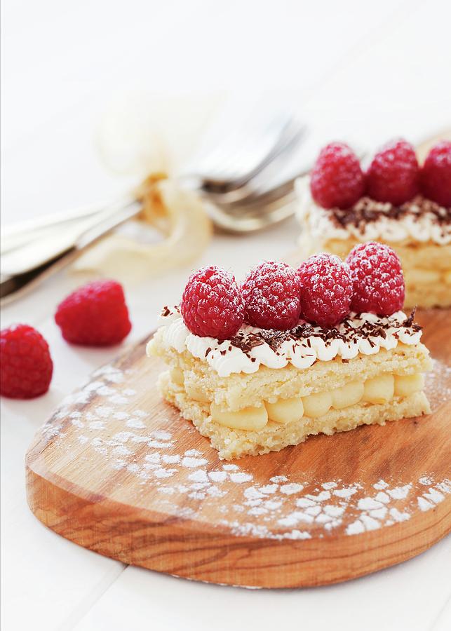 Lemon Shortbread Slices Topped With Raspberries Photograph by Jane Saunders