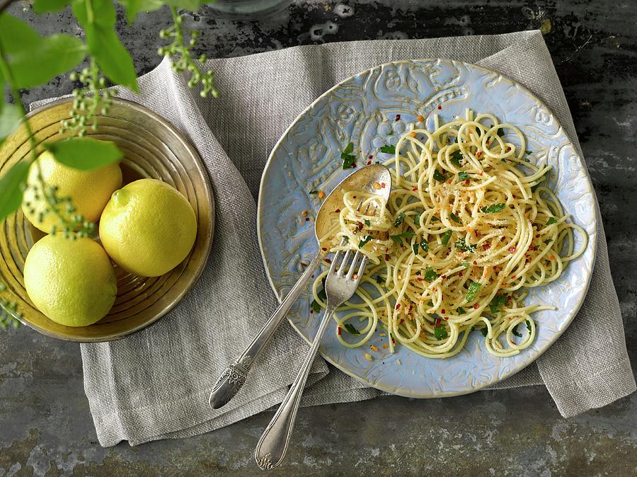 Lemon Spaghetti With Garlic, Chilli Flakes And Parsley Photograph by Laurie Proffitt