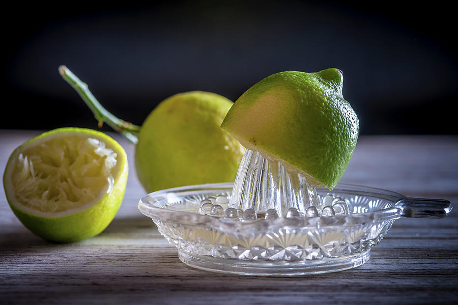 Lemon With Squeezer Photograph by Nitin Kapoor