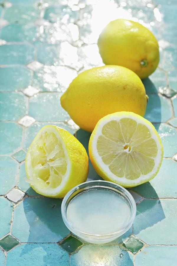 Lemons And Lemon Juice Photograph by Petr Gross