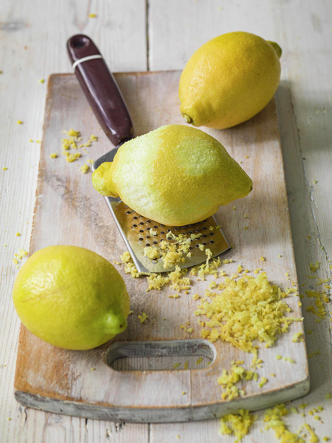 Lemons Being Grated For Lemon Zest Photograph by Michael Paul - Fine ...