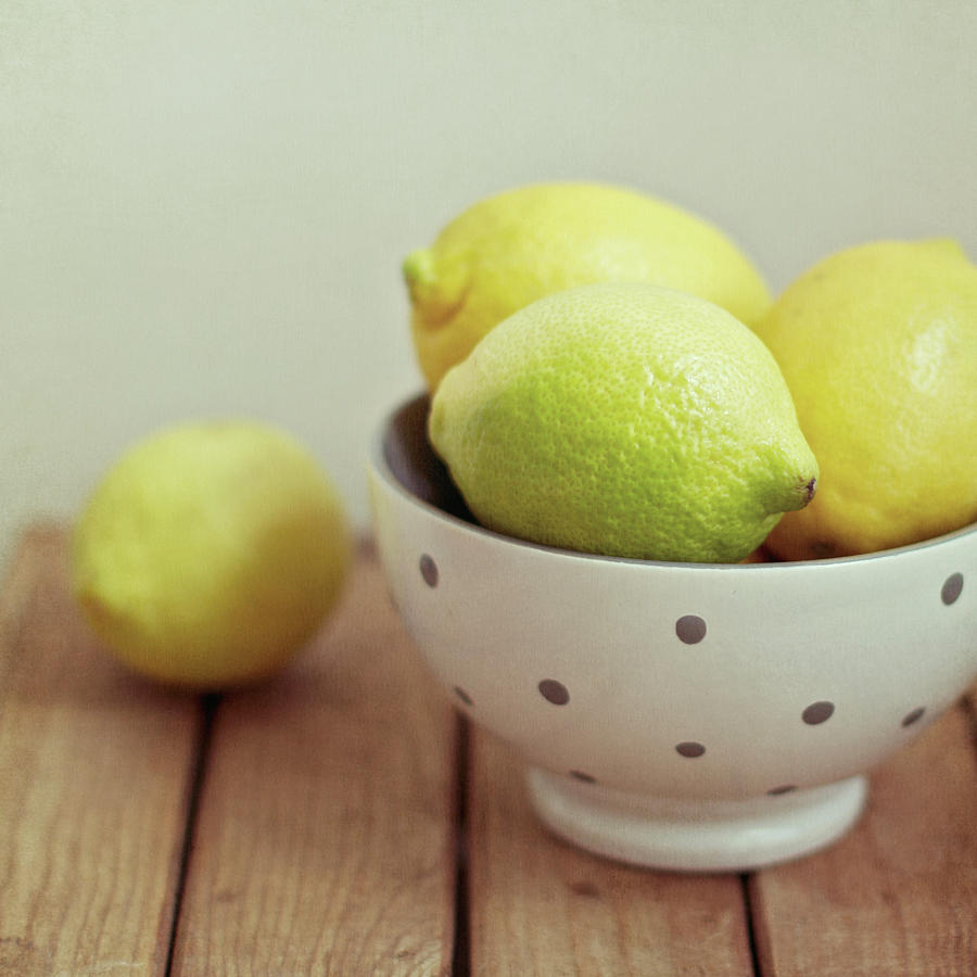 Lemon Photograph - Lemons In Bowl by Copyright Anna Nemoy(xaomena)