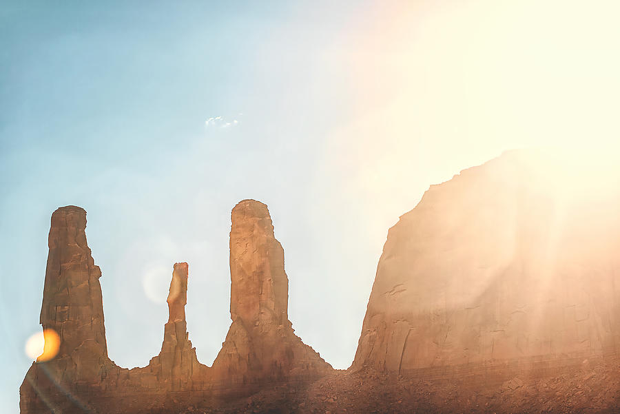 Landscape Photograph - Lens Flare Over Sandstone Formations, Arizona by Cavan Images