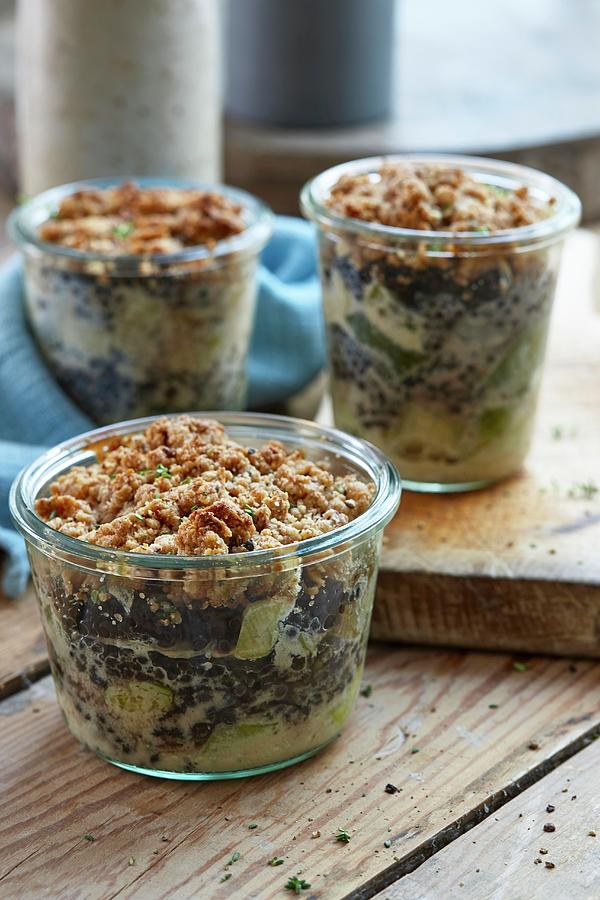 Lentil And Nut Crumble In Glasses Photograph by Misha Vetter