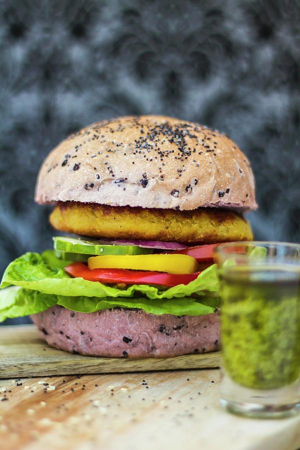 Lentil Burger In A Roll Made From Rice Flour Photograph by Elle Brooks