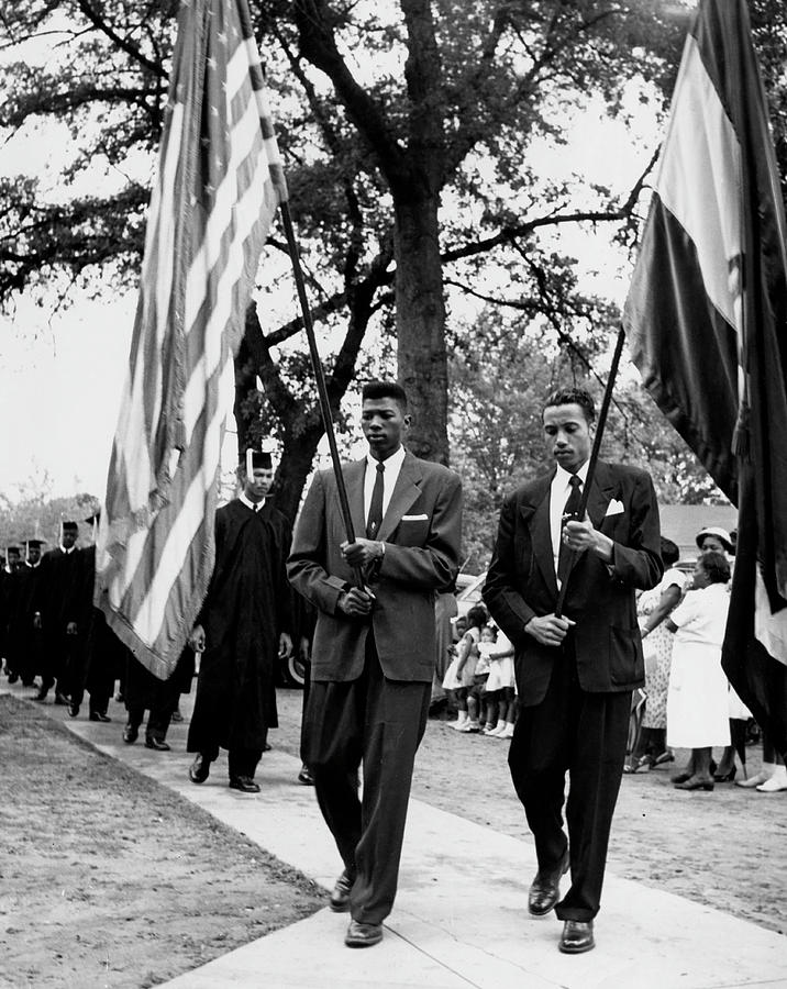 Leo Twiggs And Frank Reeder Carry Flags Photograph by Claflin University