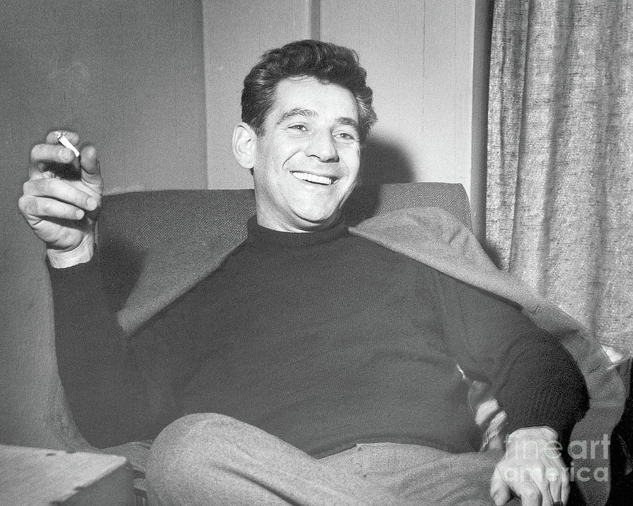 Leonard Bernstein Smoking A Cigarette Photograph by Bettmann