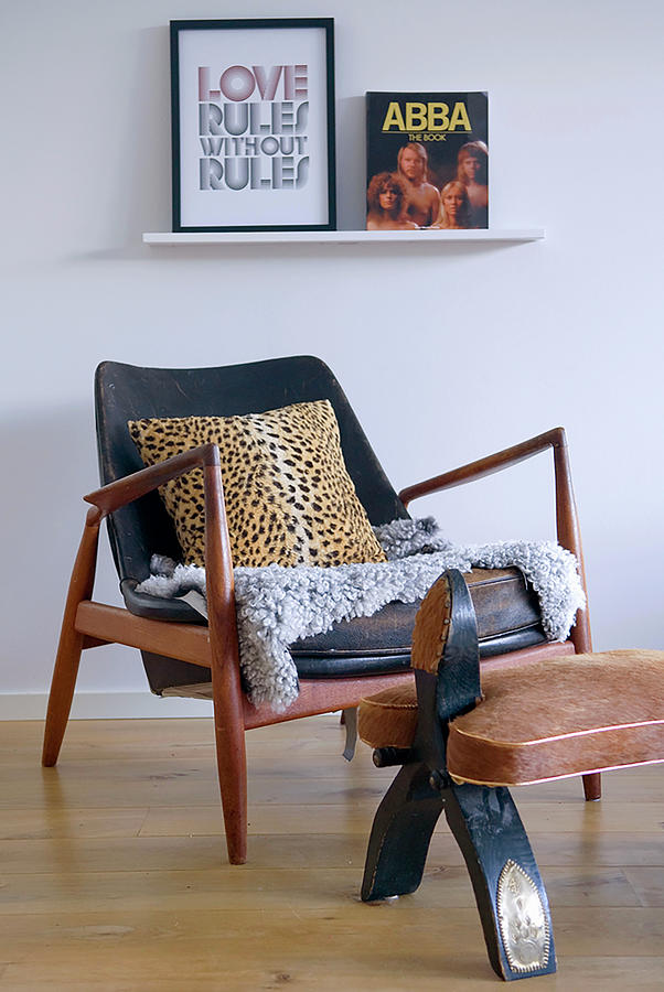 Leopard-print Cushion On Retro Armchair With Footstool Photograph by Magdalena Bjrnsdotter