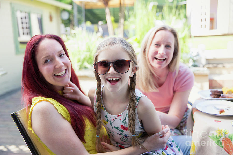 Lesbian Couple And Daughter With Sunglasses Photograph By Caia Image