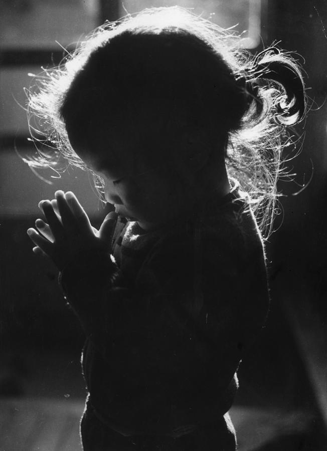 Let Us Pray Photograph by Keystone