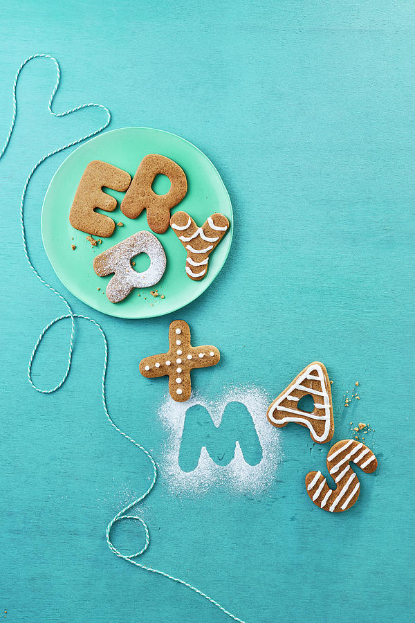 Letter Biscuits Spelling merry Xmas With Icing Sugar Photograph by Arjan Smalen Photography