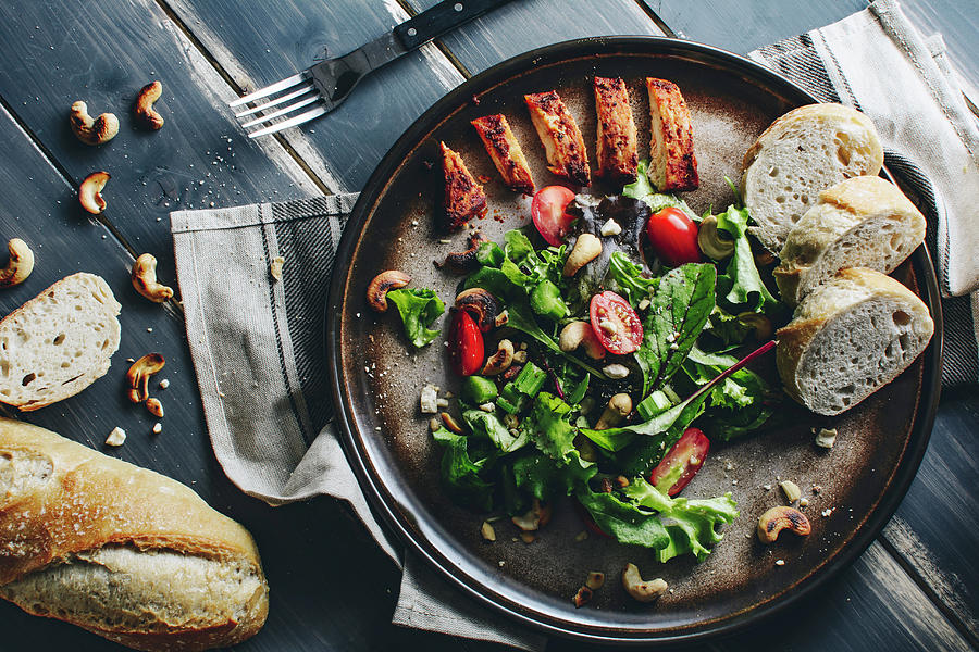 Lettuce With Cherry Tomatoes And Roasted Cashew Nuts, Marinated Chicken Breast And Baguette Photograph by Mateusz Siuta