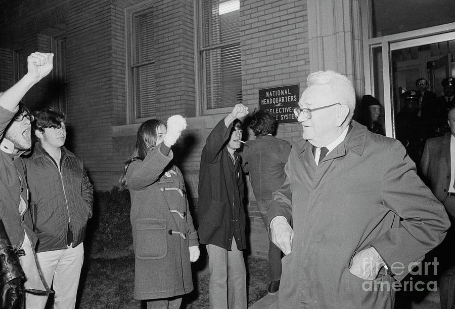 Lewis Hershey Greeted By Protesters Photograph by Bettmann