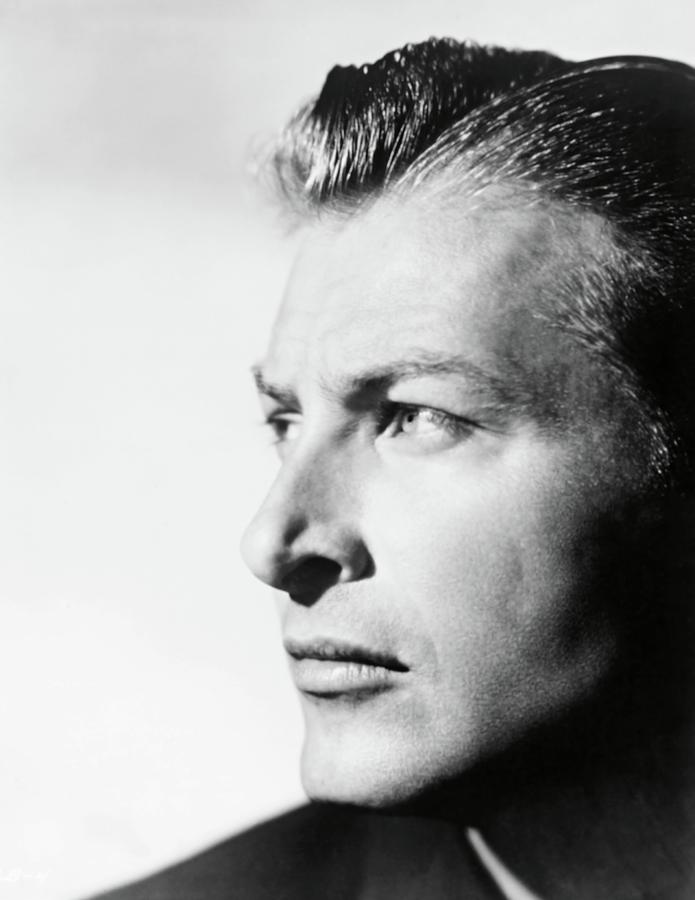 LEX BARKER in THE YELLOW MOUNTAIN -1954-. Photograph by Album