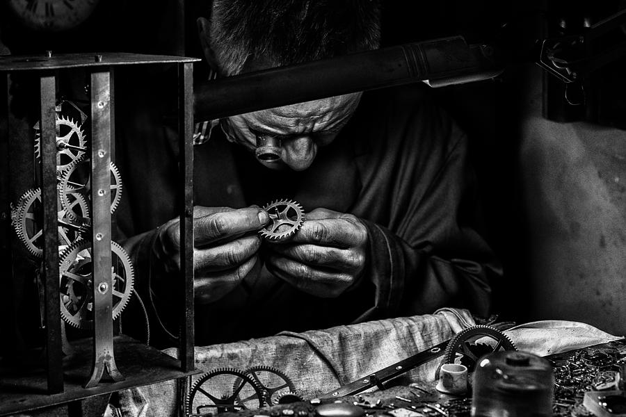 Lhorloger (watchmaker) Photograph by Manu Allicot