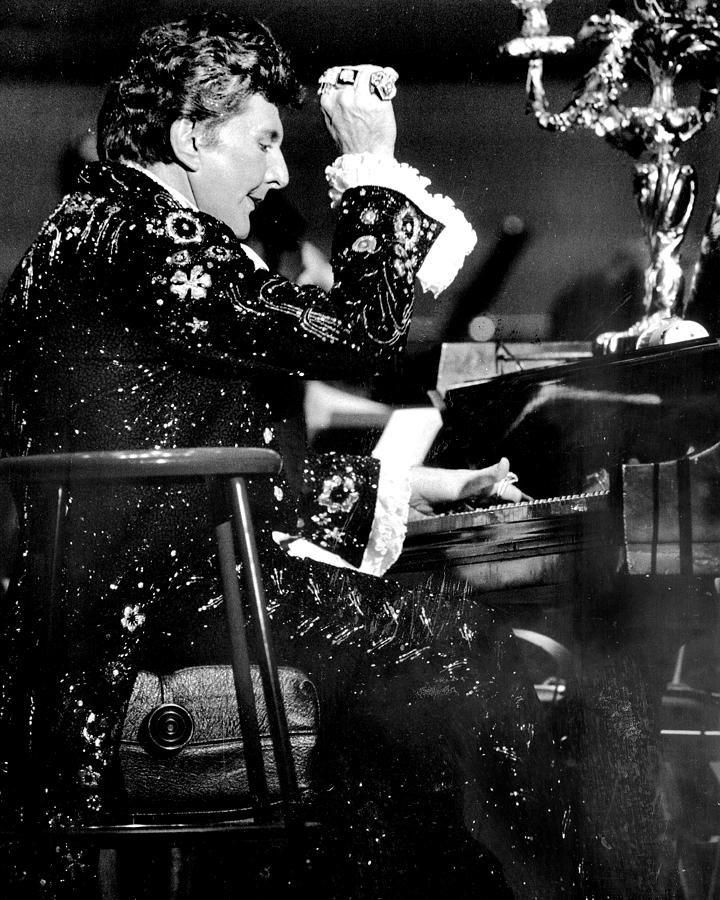 Liberace Takes His Turn At The Piano At Photograph by New York Daily News Archive