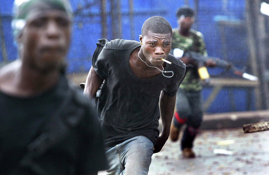 Liberian Government Forces Continue To Photograph by Chris Hondros