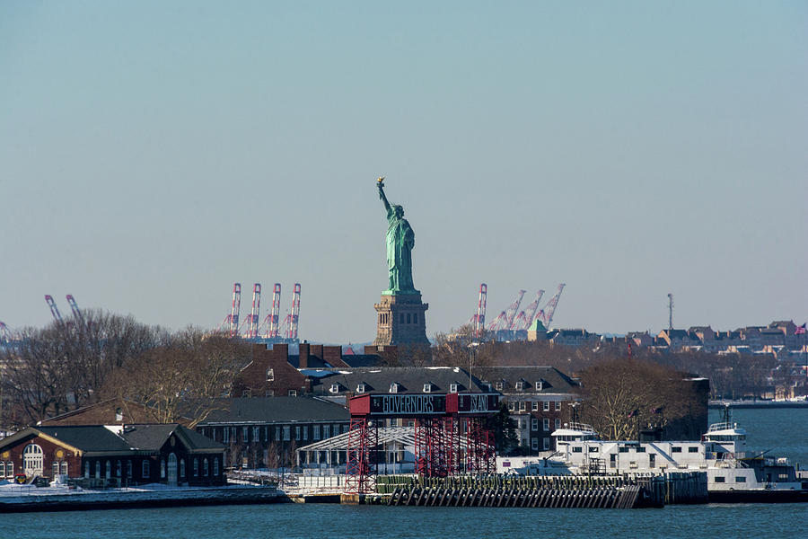 Liberty and Governors Island Photograph by Mark Hunter