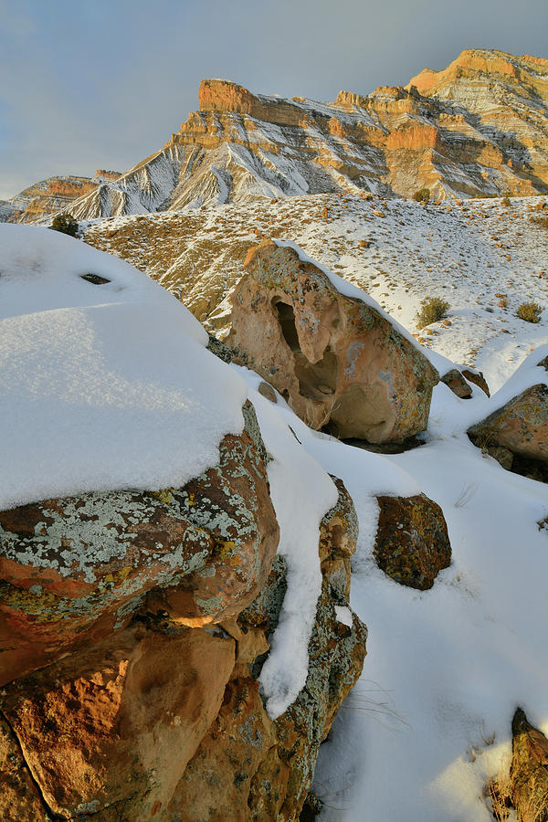 Lichen Covered Boulders Beneath Snow in the Book Cliffs Photograph by Ray Mathis