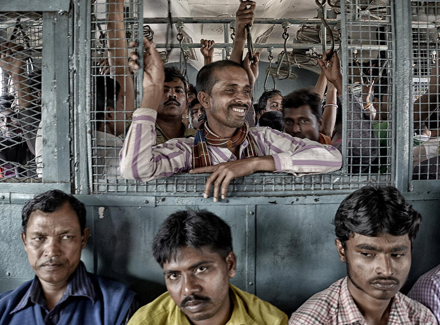 Moment Photograph - Life In A Metro by Avishek Das