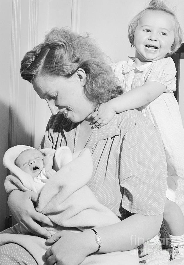 Lifeboat Baby And Mother Photograph by Bettmann