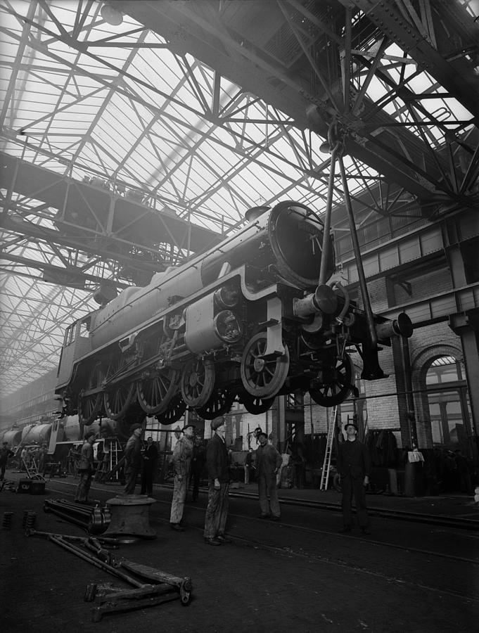 Lifting A Train Photograph by Fox Photos