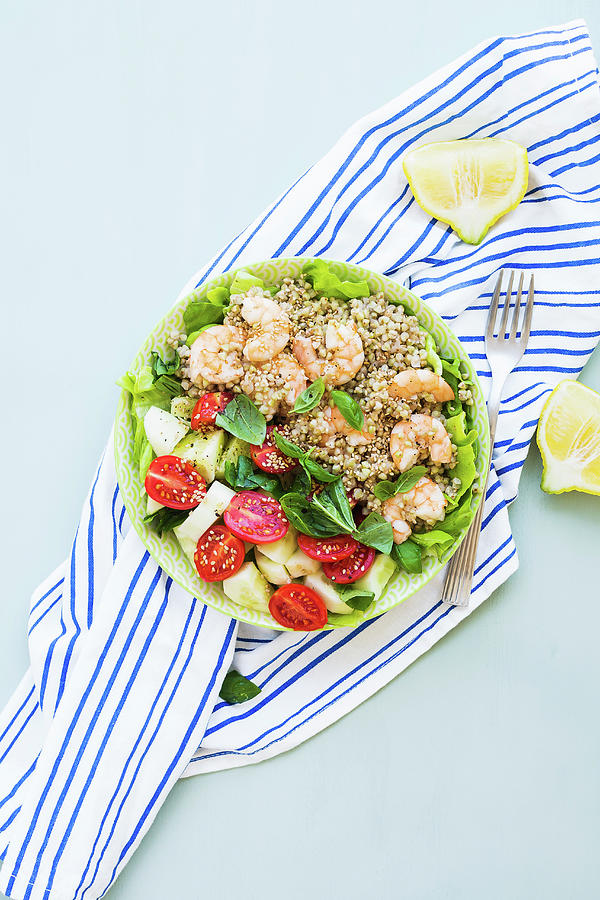 Light Summer Gluten Free Lunch Bowl With Buckweat, Cucumber, Tomatoes And Prawns On Lettuce Leaves Photograph by Sofya Bolotina