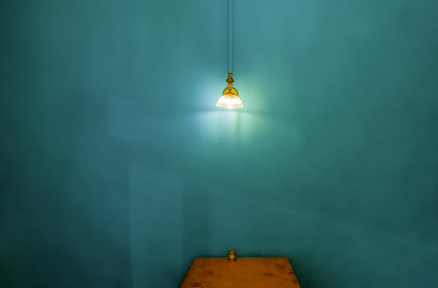 Light Table Blue Wall Photograph by Rabia Basha