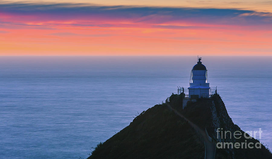 Lighthouse at Nugget Point, New Zealand Photograph by Henk Meijer Photography