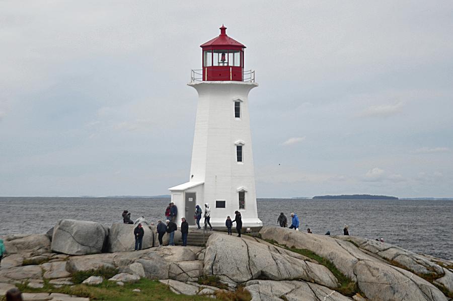 Lighthouse At Peggys Cove Photograph by John Hughes