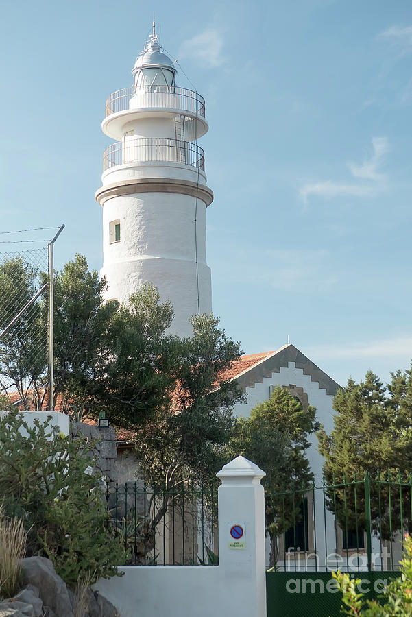 Lighthouse at Port de Soller Photograph by Rod Jones