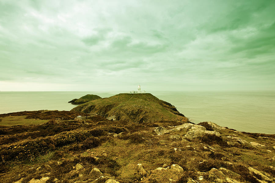 Lighthouse At Strumble Head Photograph by Tirc83