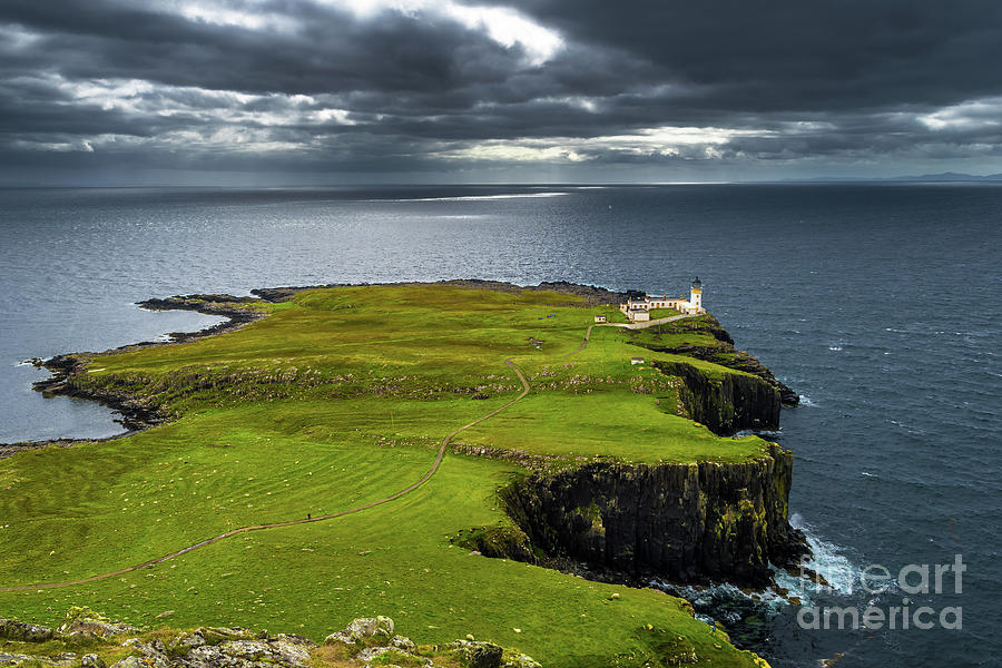 Lighthouse Of Neist Point At The Coast Of The Isle Of Skye In Scotland Photograph by Andreas Berthold
