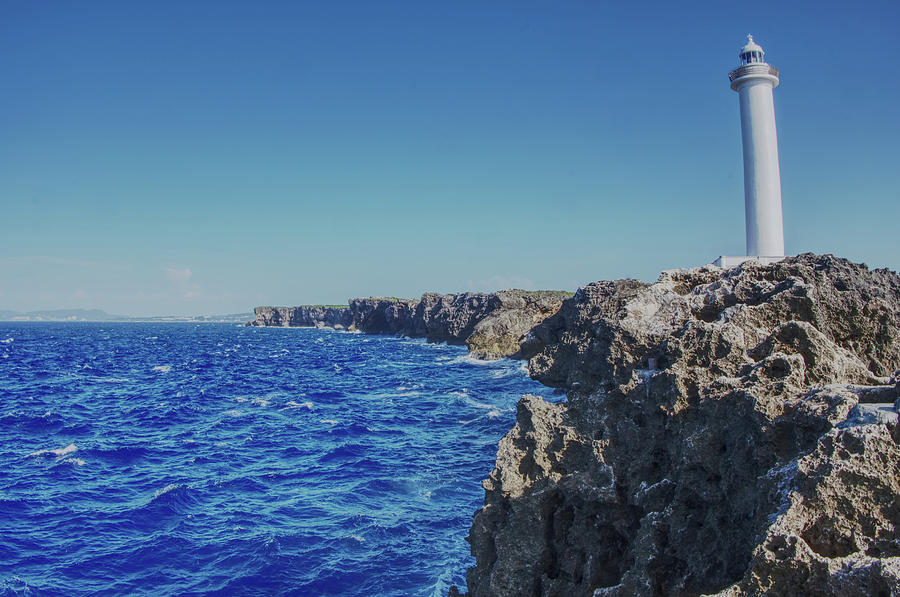 Lighthouse on the Cliffs Photograph by Eric Hafner