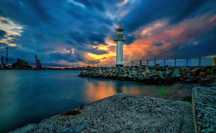 Lighthouse On The Pier At Sunset Photograph by Vasil Nanev